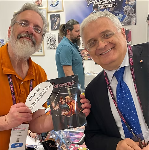 Ken Mora with fan holding Caravaggio comic